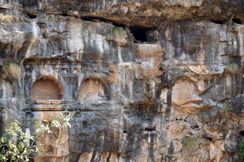 Caves on High Face of Wall