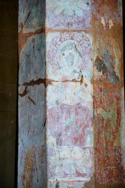Faded Buddha Figure